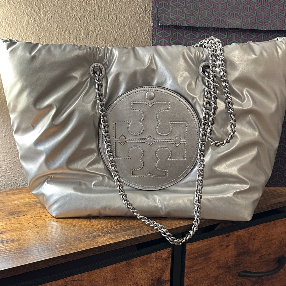 Tory Burch Ella Metallic Puffy Chain Tote in silver.